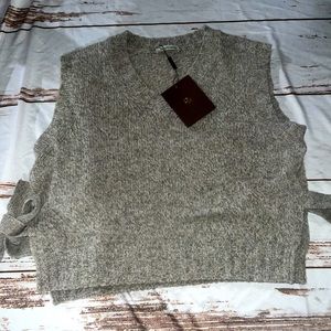 Gentle Herd 100% wool side tie sweater vest